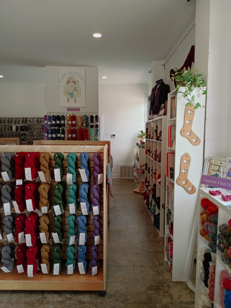 Interior of Yarn Alchemy in Bentonville showing the loving yarn and accessories